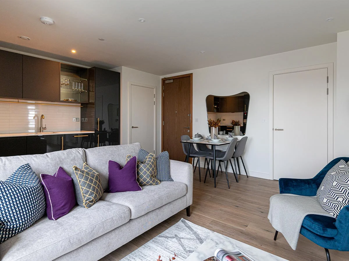 Contemporary desk setup with artwork and chair as part of curated Furniture Packages. give in humanised way