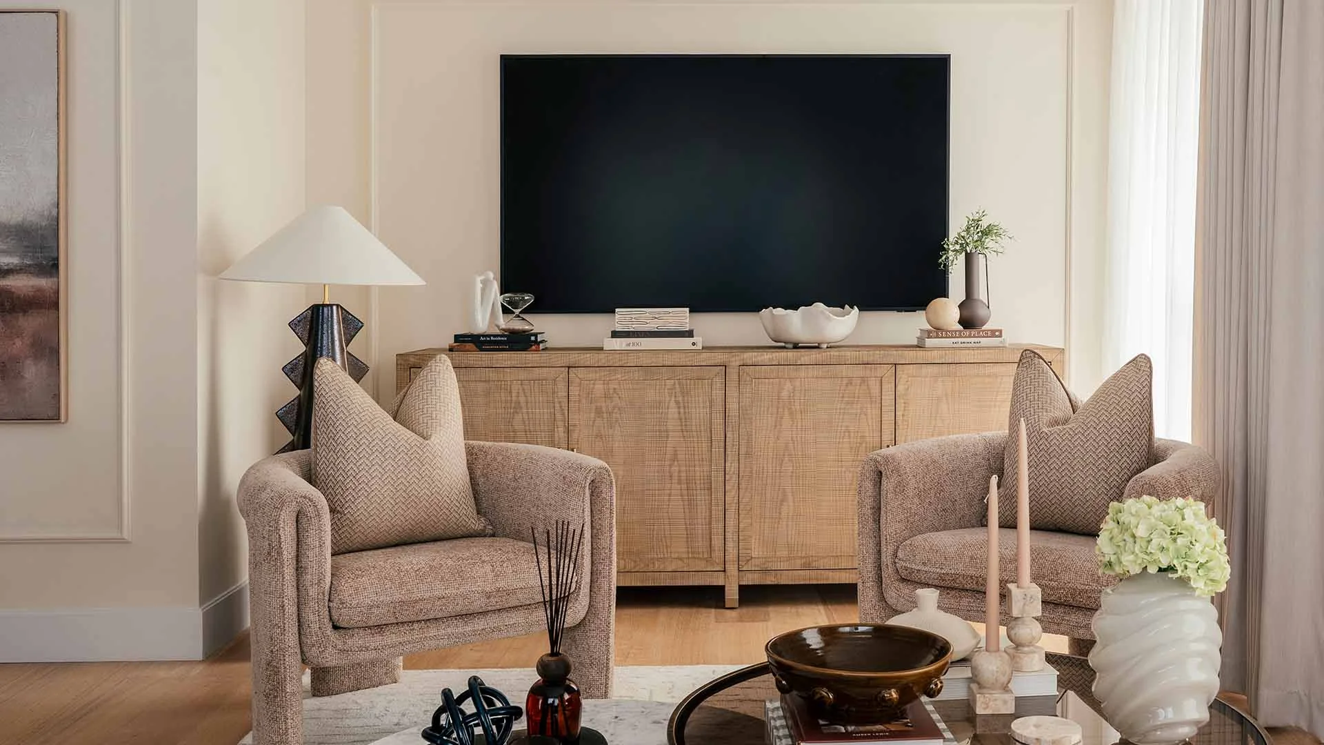 Sophisticated bedroom furnishing in a White City flat, designed to attract high-quality tenants.