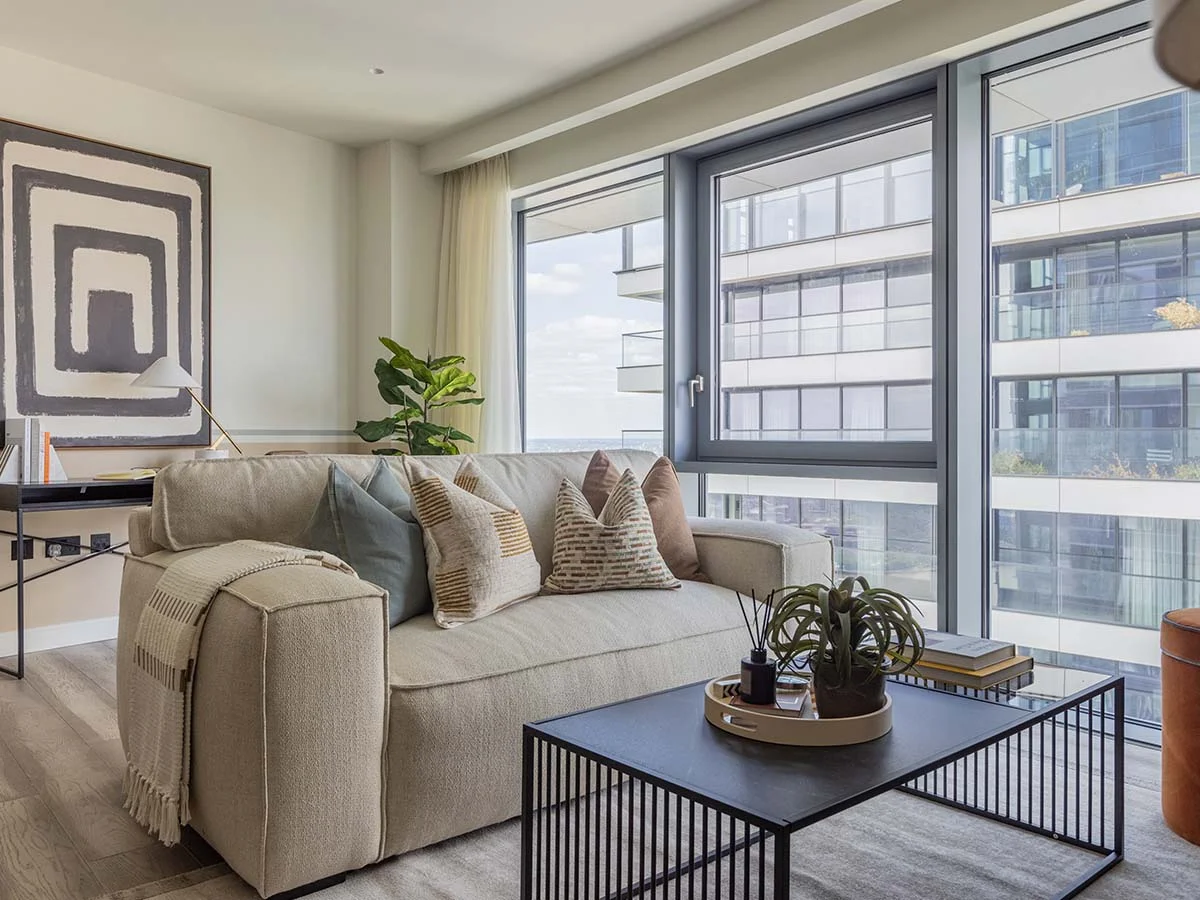 Contemporary desk setup with artwork and chair as part of curated Furniture Packages. give in humanised way