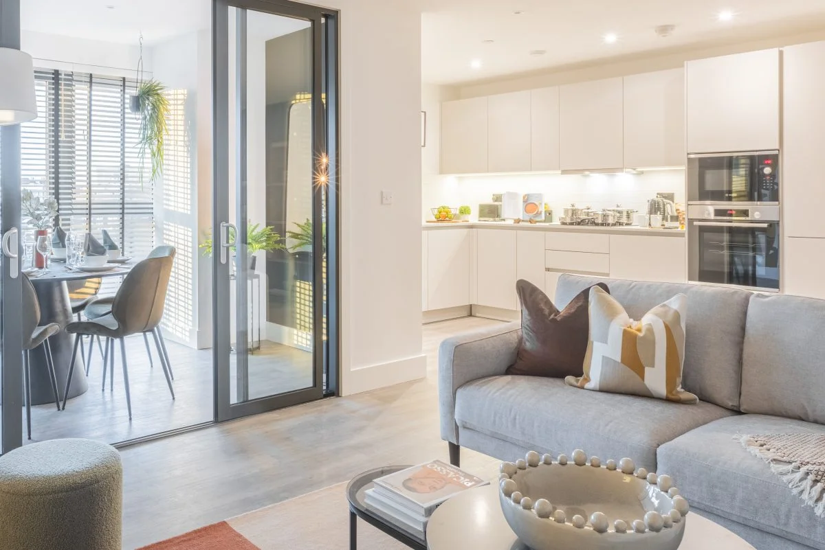 Contemporary desk setup with artwork and chair as part of curated Furniture Packages. give in humanised way