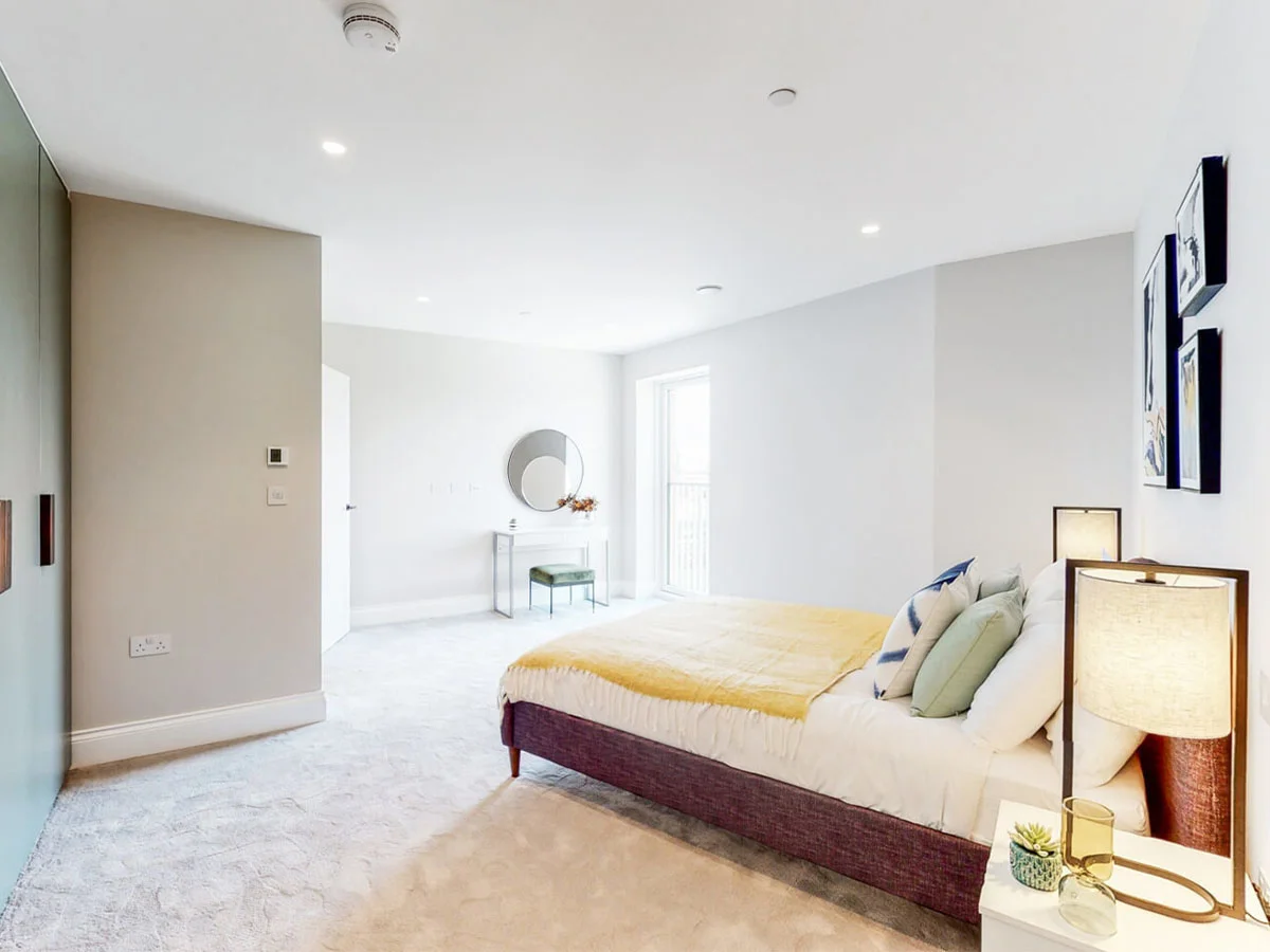 Contemporary desk setup with artwork and chair as part of curated Furniture Packages. give in humanised way