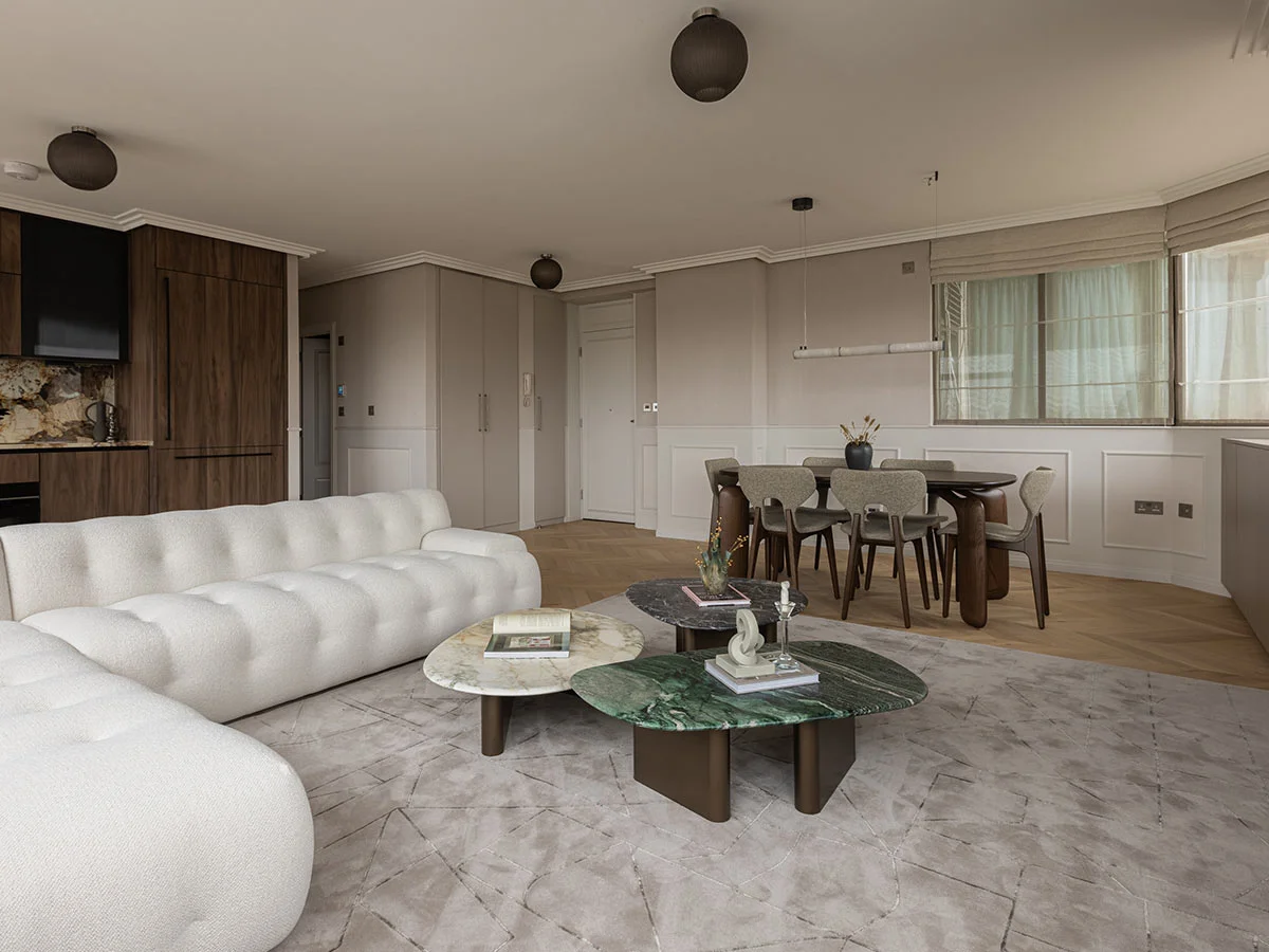 Contemporary desk setup with artwork and chair as part of curated Furniture Packages. give in humanised way