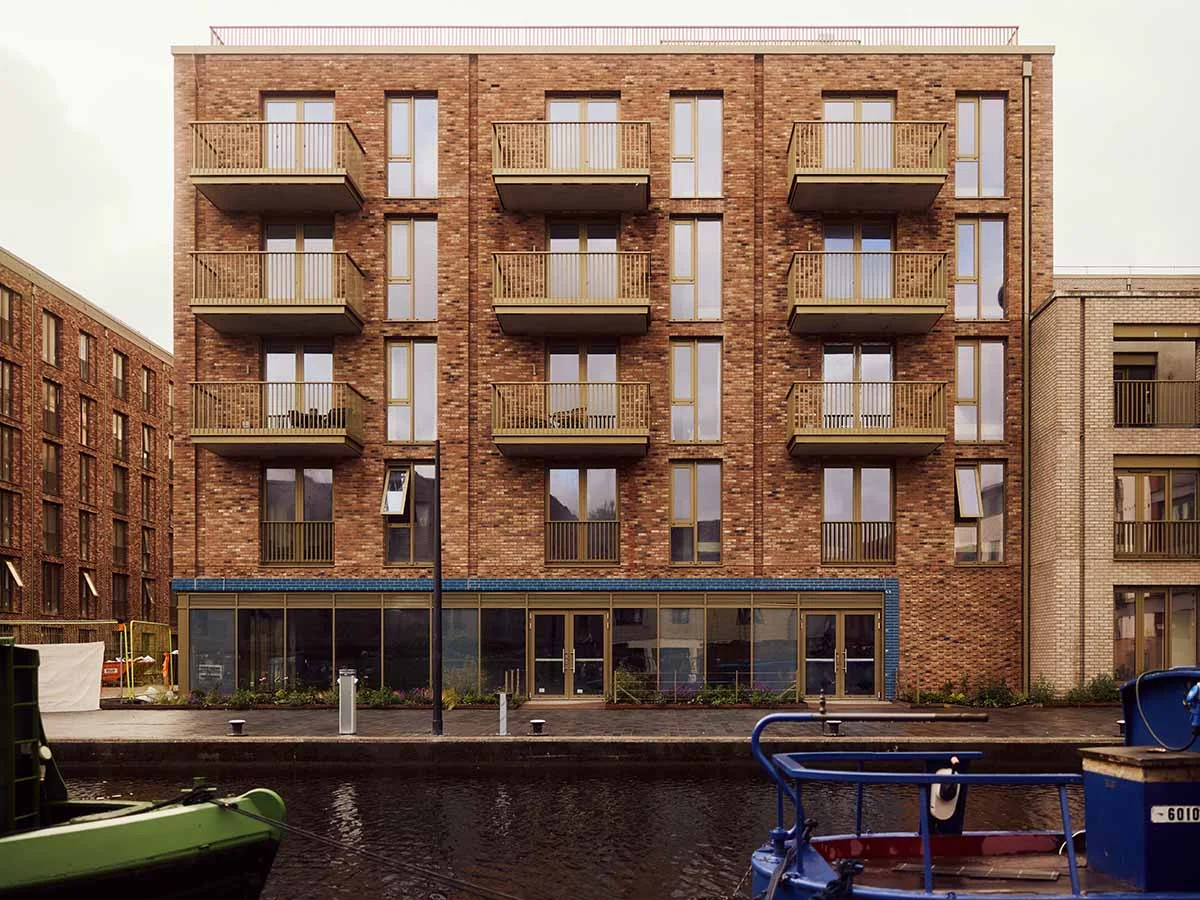 Exterior of a professionally furnished London flat building by Vastint's New Fountainbridge, appealing to overseas investors.