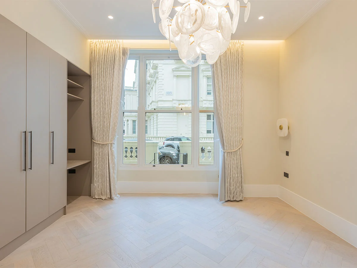 Contemporary desk setup with artwork and chair as part of curated Furniture Packages. give in humanised way