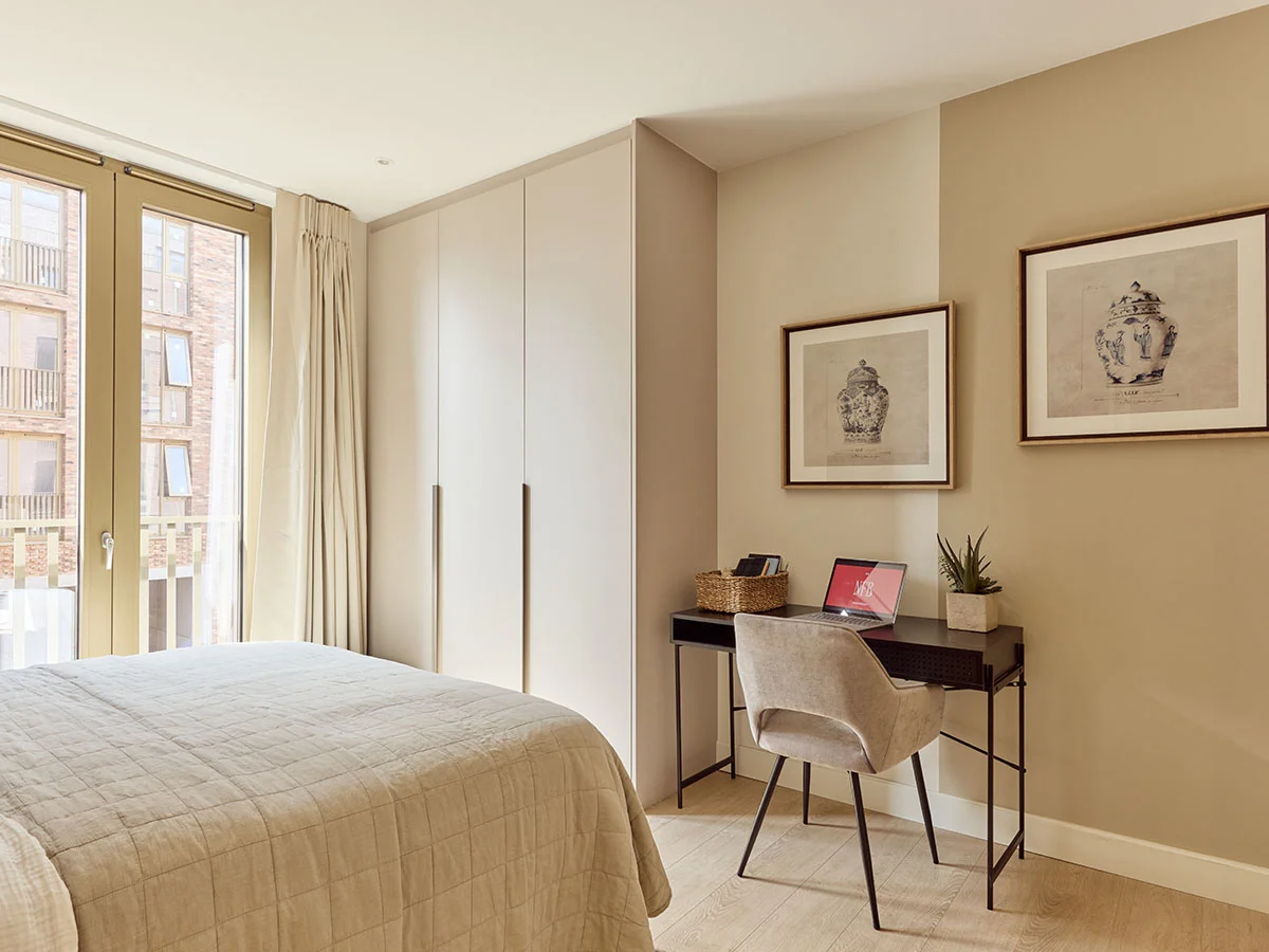 Bedroom with a workspace in a London flat, demonstrating an InStyle Direct furnishing for modern tenants