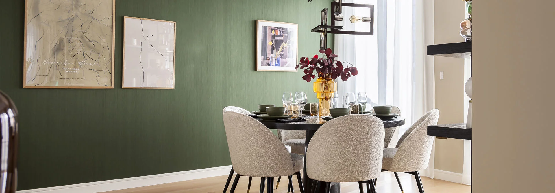  Bespoke dining room furniture and green textured walls in a luxury London rental apartment design.