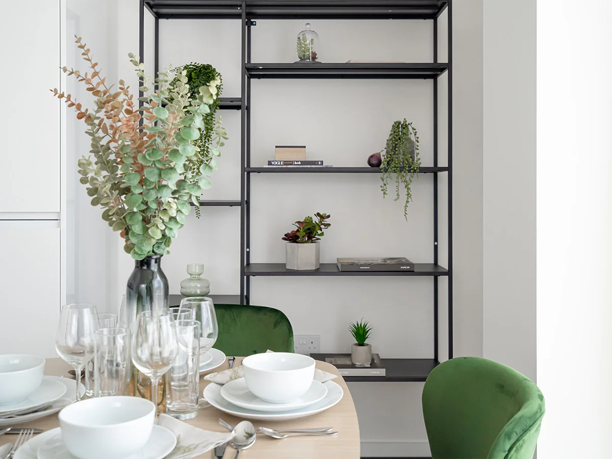 Modern BTR interior with plants and dining setup