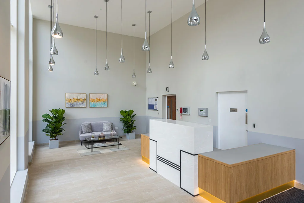 Commercial lobby concierge desk with modern interior