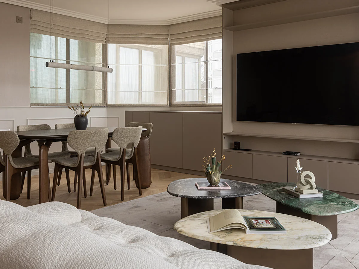 white outdoor table and chair on balcony at square roots