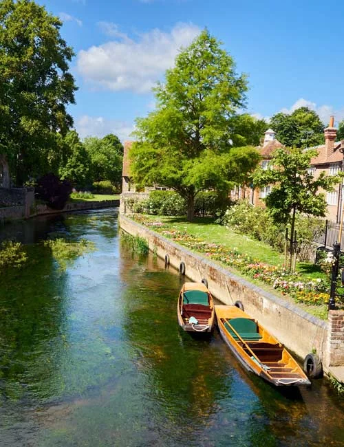 Close-up of professional furniture installation services by InStyle Direct, showing a delivery team member in a high-visibility vest handling designer furniture components for a London property