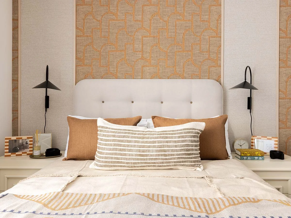 Show home bedroom styled with layered textiles to create a premium look affordably