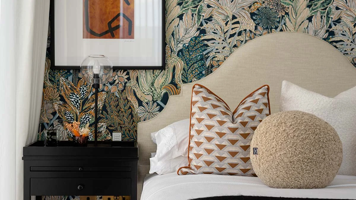 Vibrant green and pink detailed bedroom staging in a Dubai flat, demonstrating high-impact interior design for rental appeal