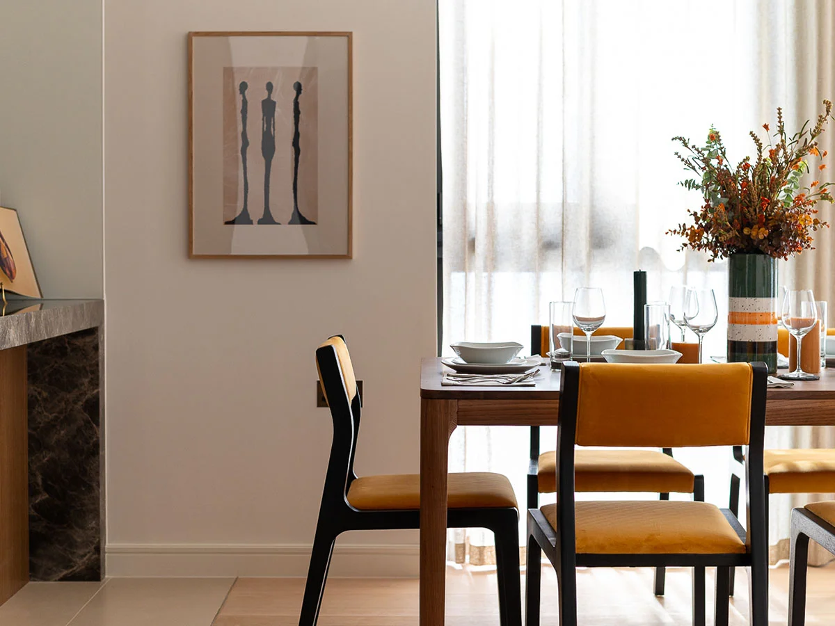 Modern dining area with mustard velvet chairs. InStyle Direct transformations for London landlords.