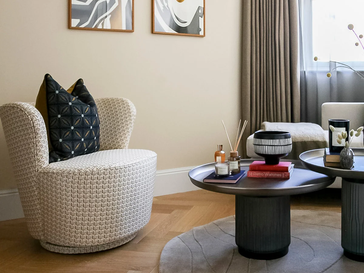 Modern open-plan apartment featuring a stylish dining setup and contemporary living area, showcasing Long-Let Furniture Packages in Dubai designed for comfort and elegance