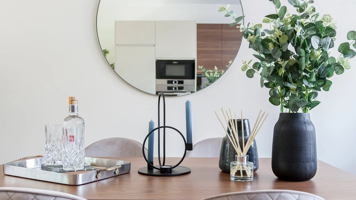 Vibrant green and pink detailed bedroom staging in a Dubai flat, demonstrating high-impact interior design for rental appeal