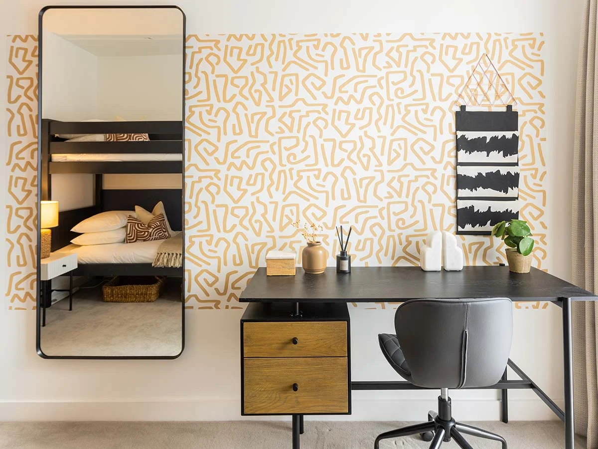 modern home office setup with creative yellow wall pattern wembley london