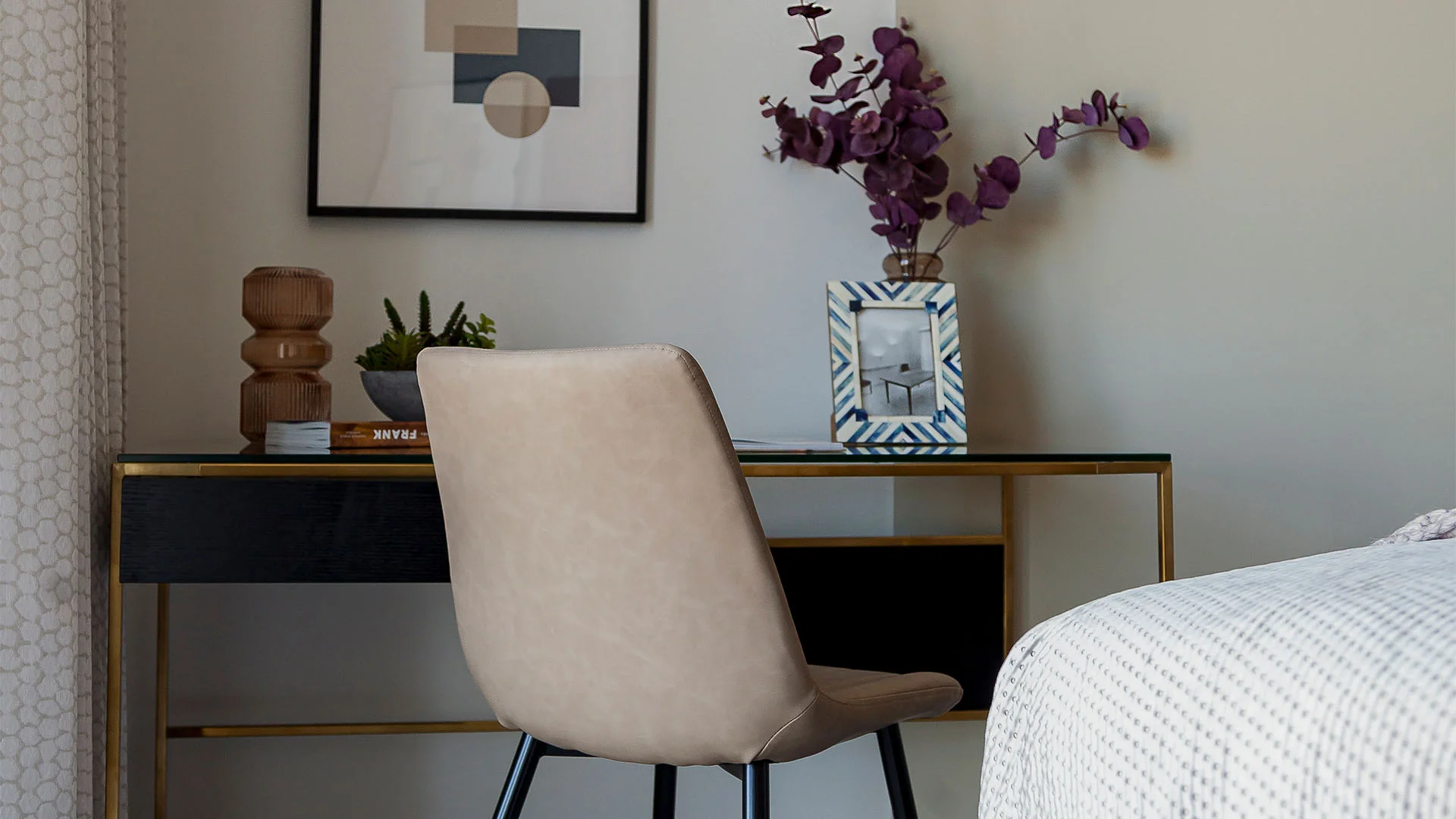 Bedside table styling with lamp and decor in West End Gate showhome