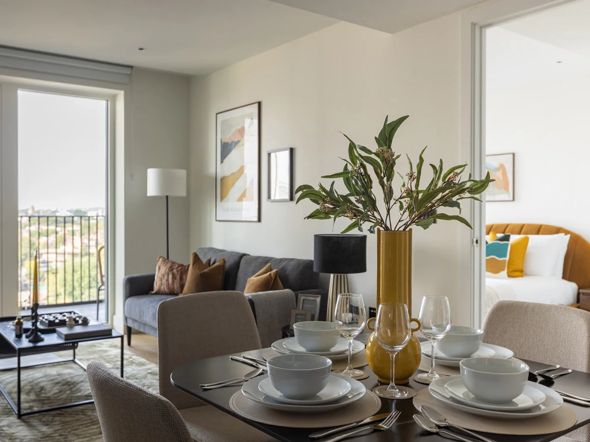 Modern furnished apartment with dining and living area