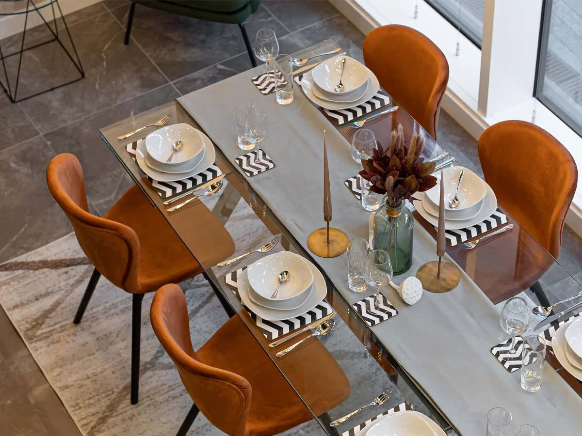 showroom dining table display with styled furniture setup for interior design presentation