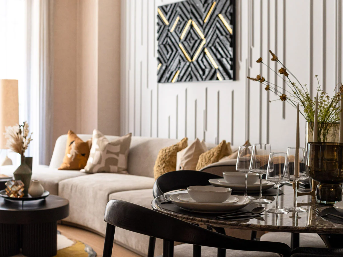 Sophisticated open-plan dining and living area. Professional furnishing for increased London rental appeal.