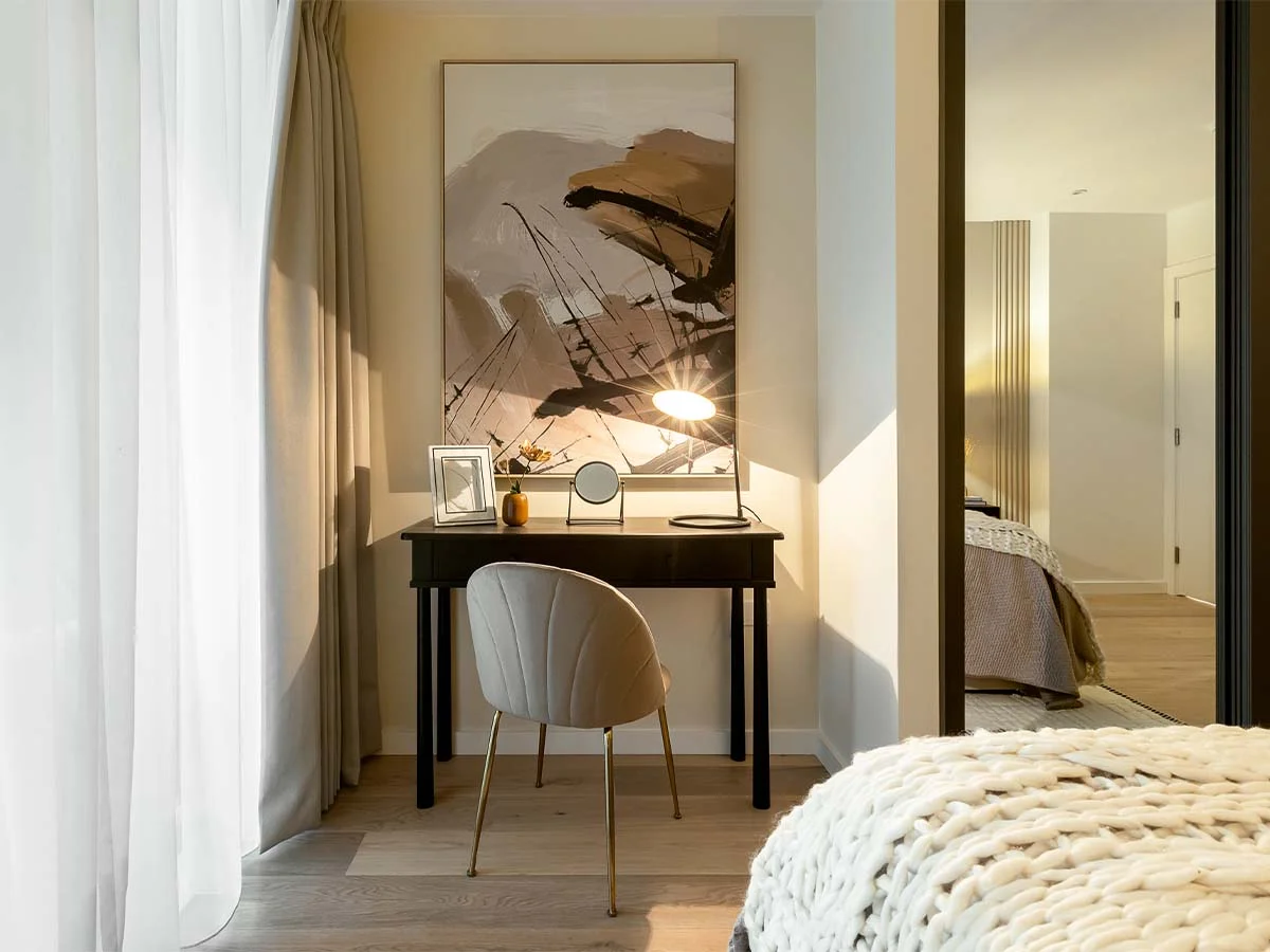 Custom workspace with desk chair and decor styled in tailored furniture package apartment