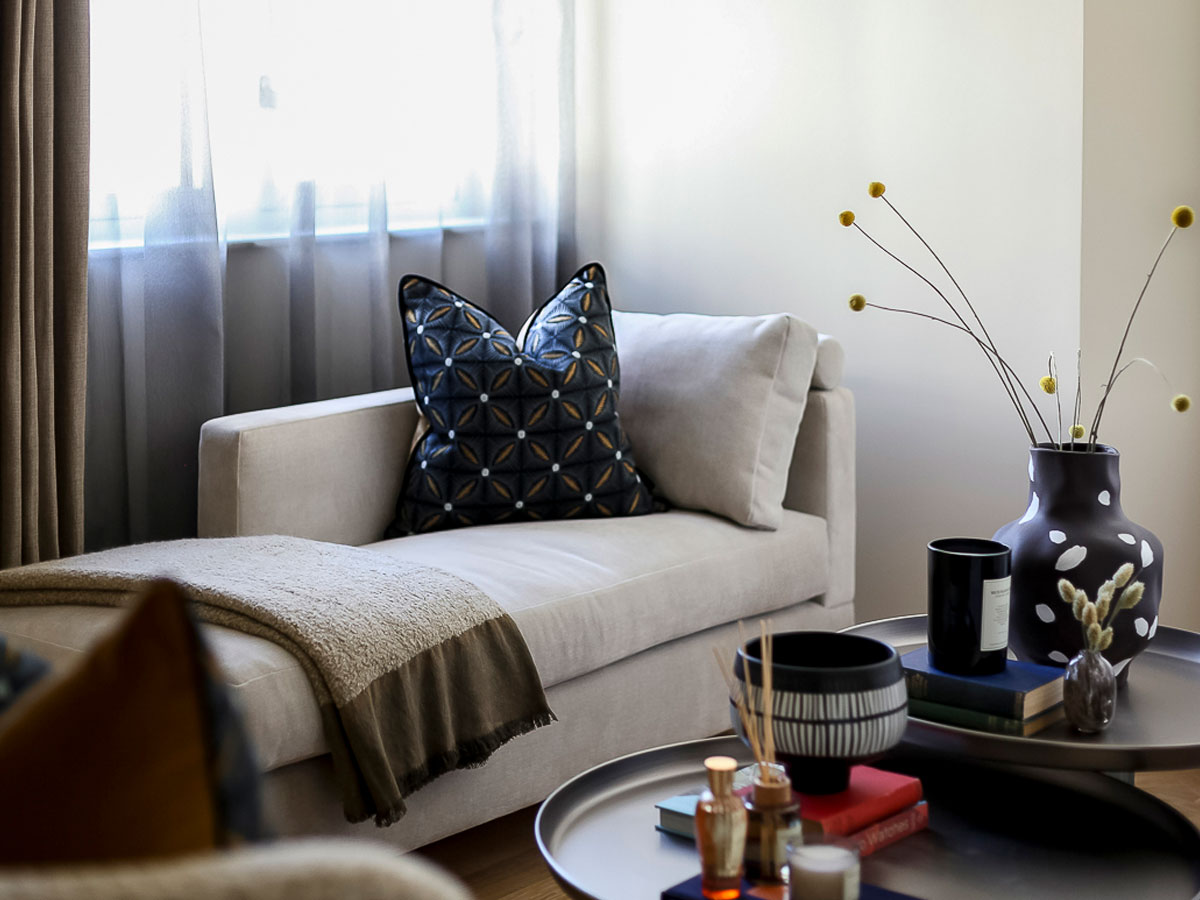 A serene living space with soft drapes and modern décor, perfectly highlighting refined window treatments for Dubai