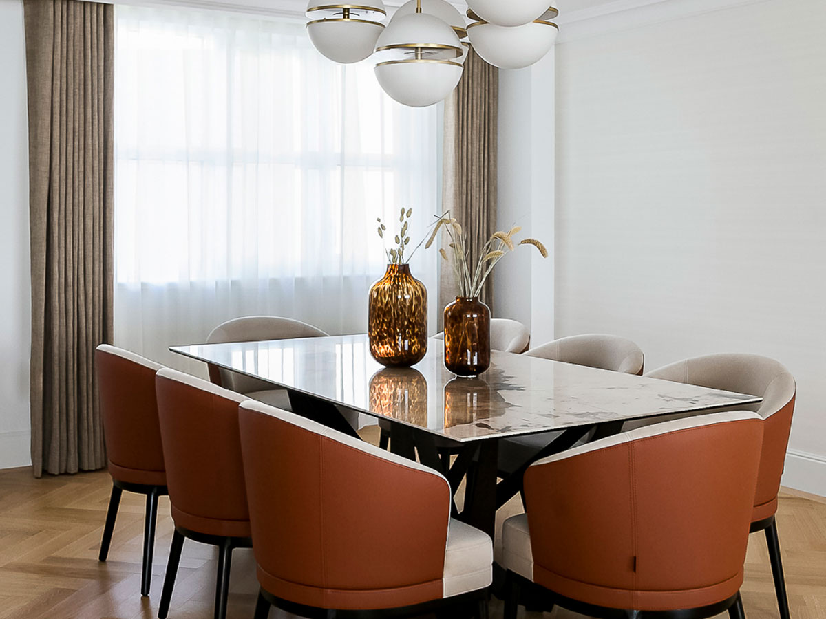 Elegant, premium dining room with designer lighting. Maximizes London flat rental yield for overseas landlords with luxury furnishing