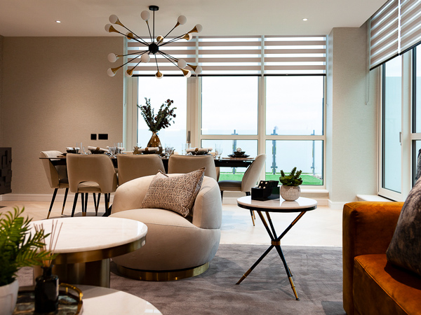 Luxury furnished open-plan living/dining area with stylish lighting and view. Perfect for UAE investors seeking top London flat rental yield