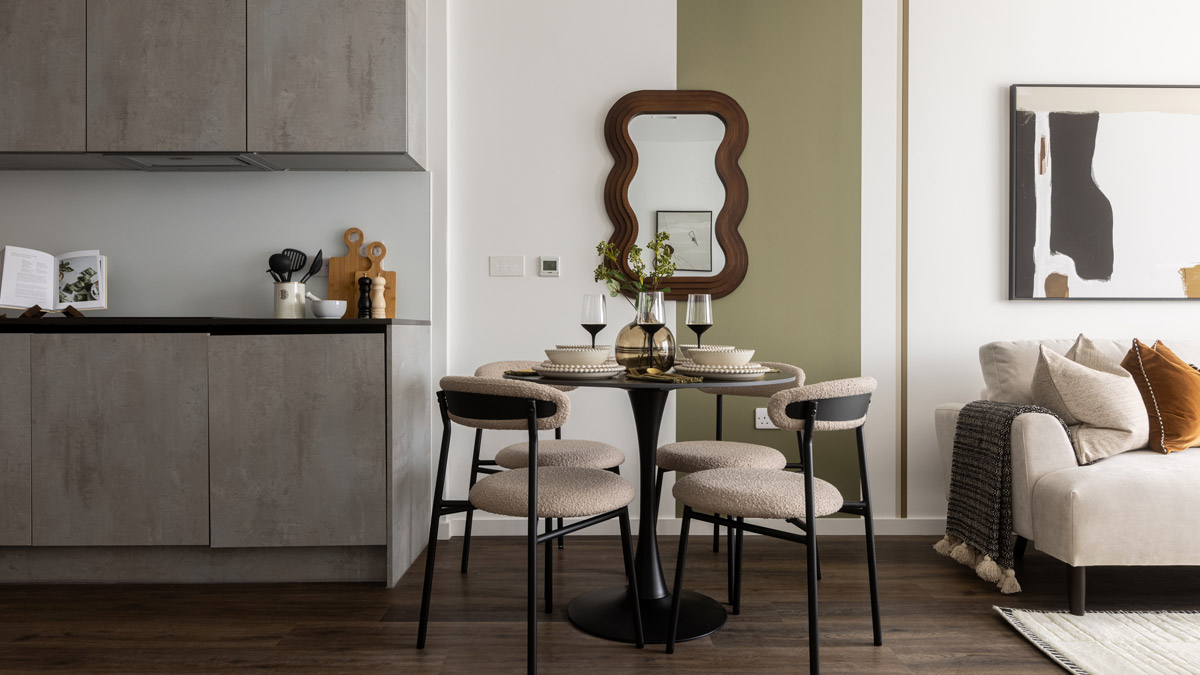 A chic urban lounge and kitchen pairing, showcasing how Residential Interior Design Dubai merges luxury living with functional minimalism