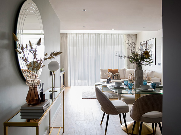 Bright, professionally staged open-plan London flat dining and living area, maximizing rental return on investment