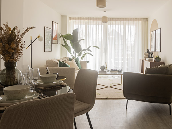 Bright, professionally styled open-plan living and dining area in a London flat, maximizing rental appeal for overseas investors