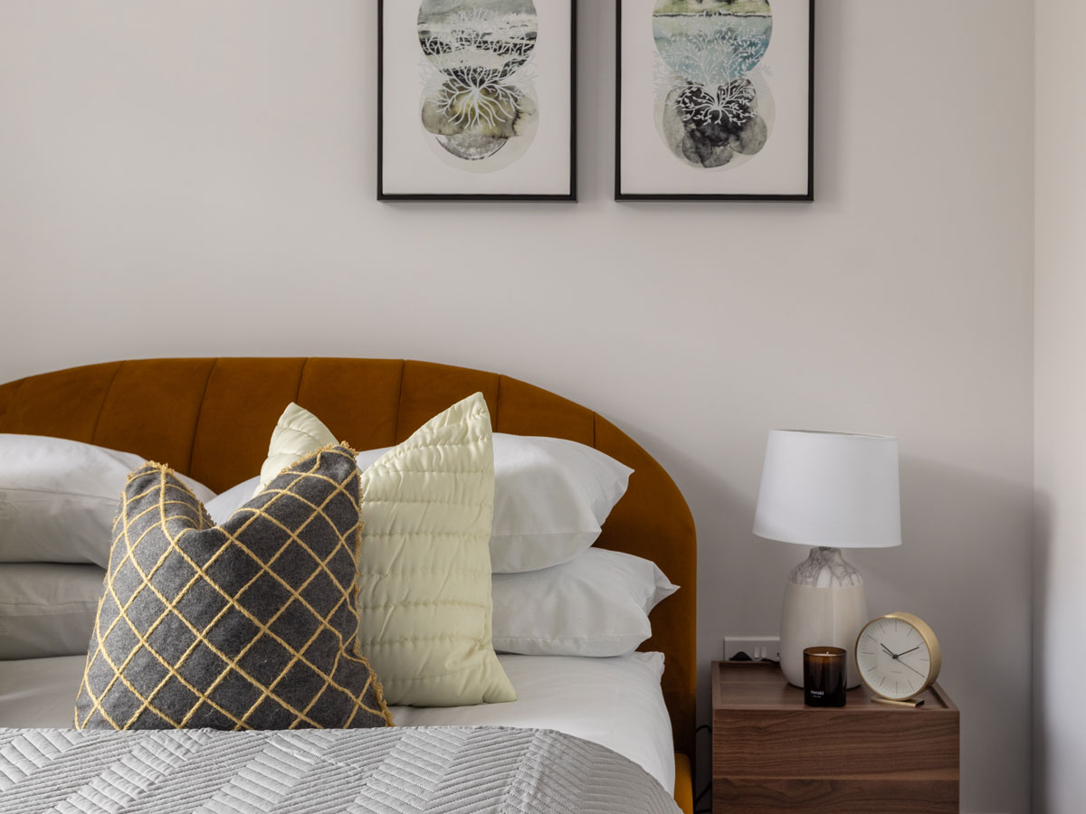 Elegant and minimalist furnished London flat bedroom, optimized to maximize rental appeal for overseas investors