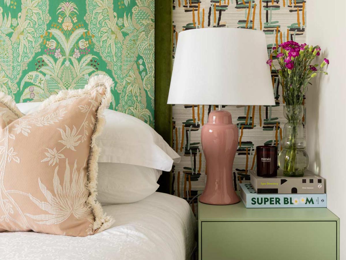 Vibrant green and pink detailed bedroom staging in a London flat, demonstrating high-impact interior design for rental appeal