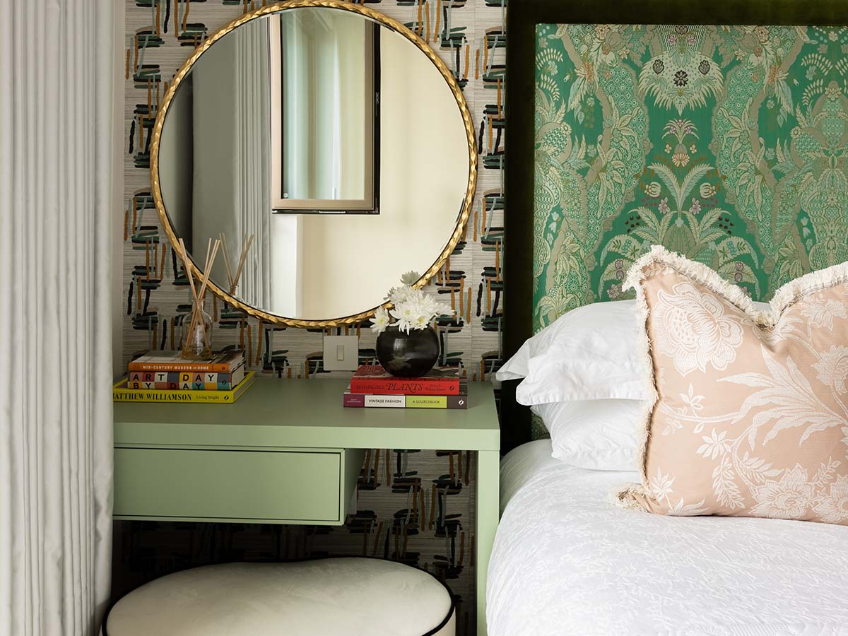 Elegant London flat bedroom with stylish green decor, showcasing InStyle Direct's professional furnishing for rental appeal