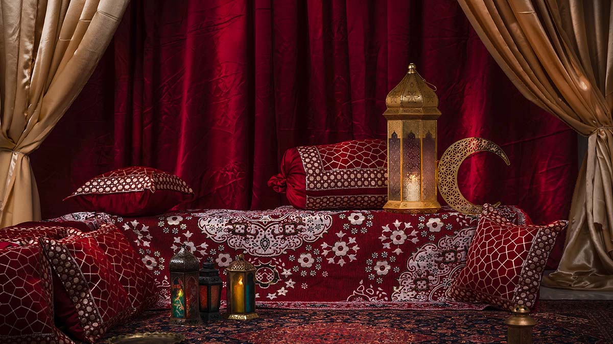 Traditional Ramadan majlis decor with lanterns and floor seating
